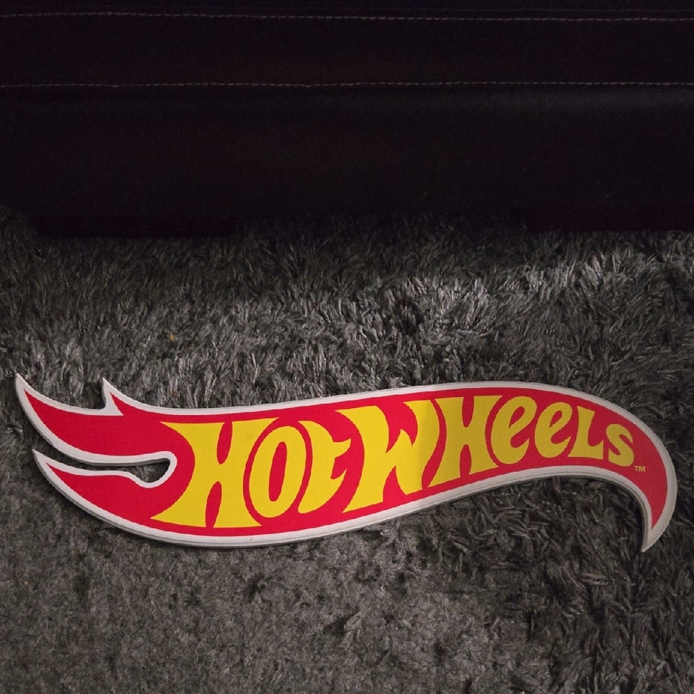 Open Road Brands Hot Wheels Flame Logo Sign in Red and Yellow